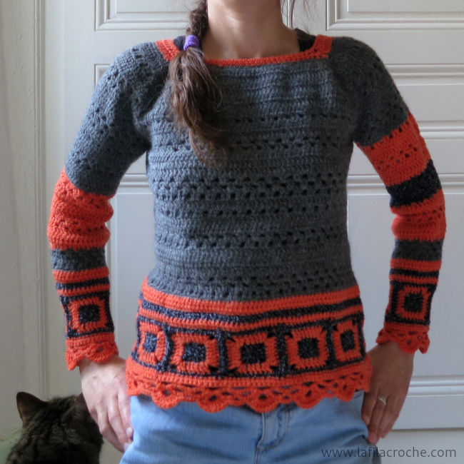 Pull au crochet orange et gris
